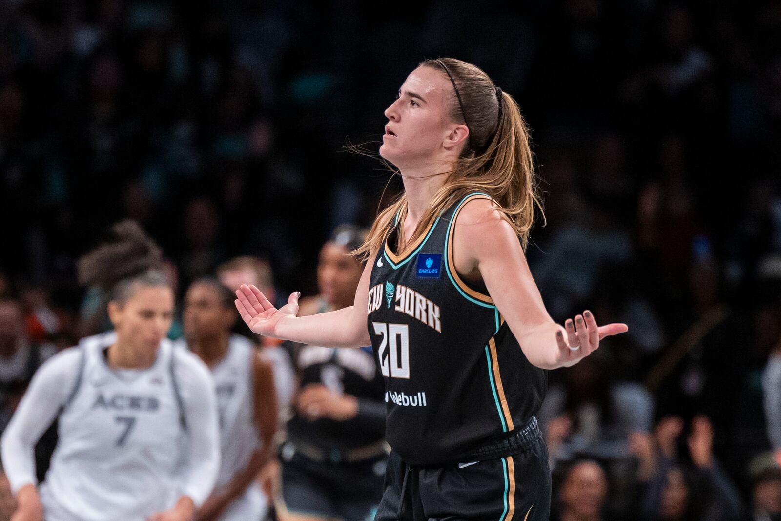 New York Liberty guard Sabrina Ionescu (20) celebrates after a basket during the second half of a WNBA basketball second-round playoff game against the Las Vegas Aces, Sunday, Sept. 29, 2024, in New York. (AP Photo/Corey Sipkin)