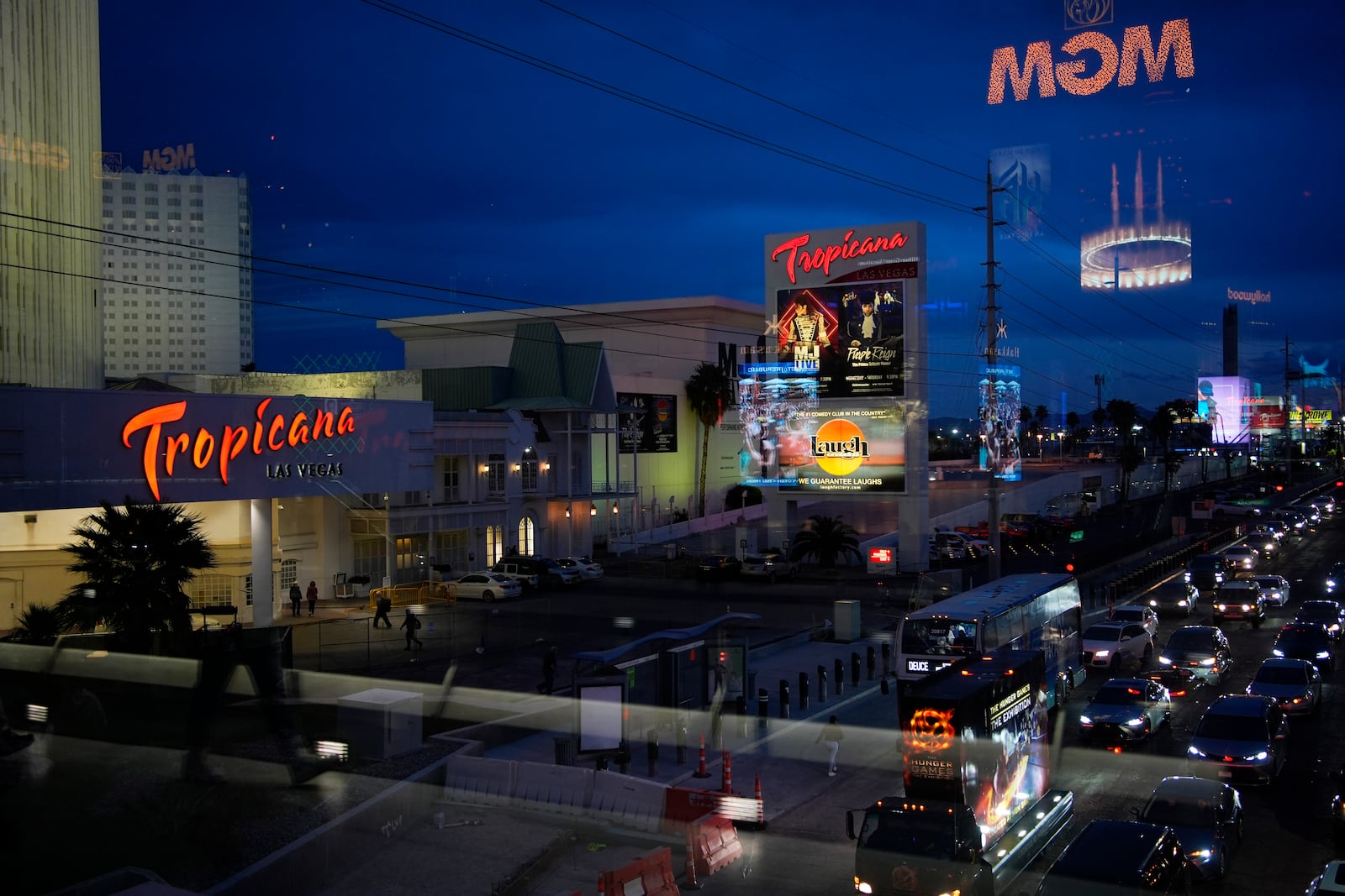 FILE - Cars drive by the Tropicana hotel-casino along the Las Vegas Strip, Thursday, March 28, 2024, in Las Vegas. (AP Photo/John Locher, File)