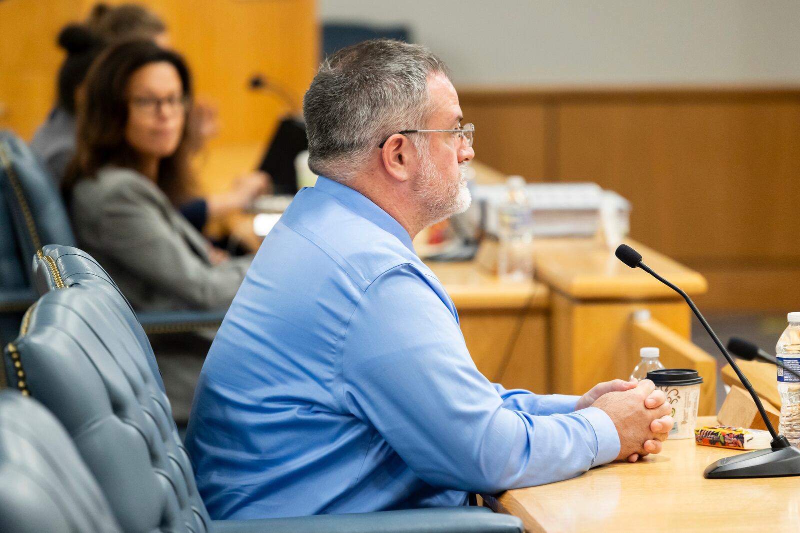 Matthew McCoy, a former OceanGate employee, listens to questions from the investigative board during the final day of the Coast Guard investigatory hearing on the causes of the implosion of an experimental submersible headed for the wreck of the Titanic, Friday, Sept. 27, 2024, in North Charleston, S.C. (AP Photo/Mic Smith)