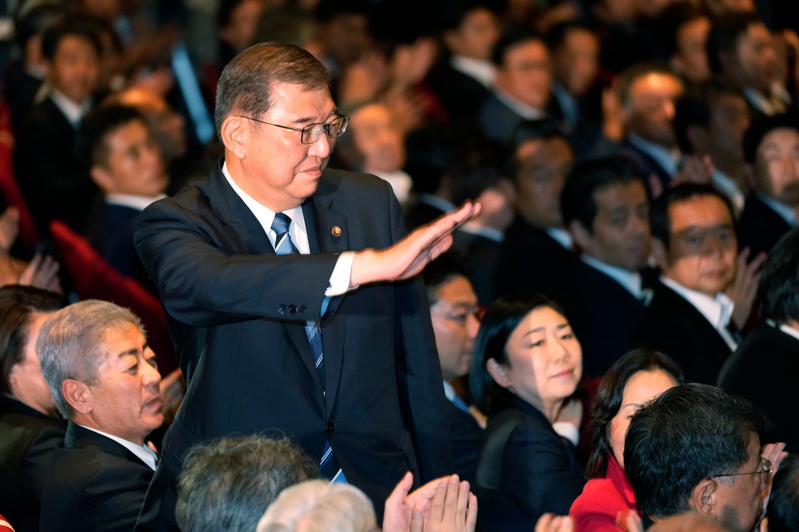 Shigeru Ishiba acknowledges after he was elected as new head of Japan's ruling Liberal Democratic Party's (LDP) party during the party's leadership election Friday, Sept. 27, 2024, in Tokyo. (AP Photo/Hiro Komae, Pool)