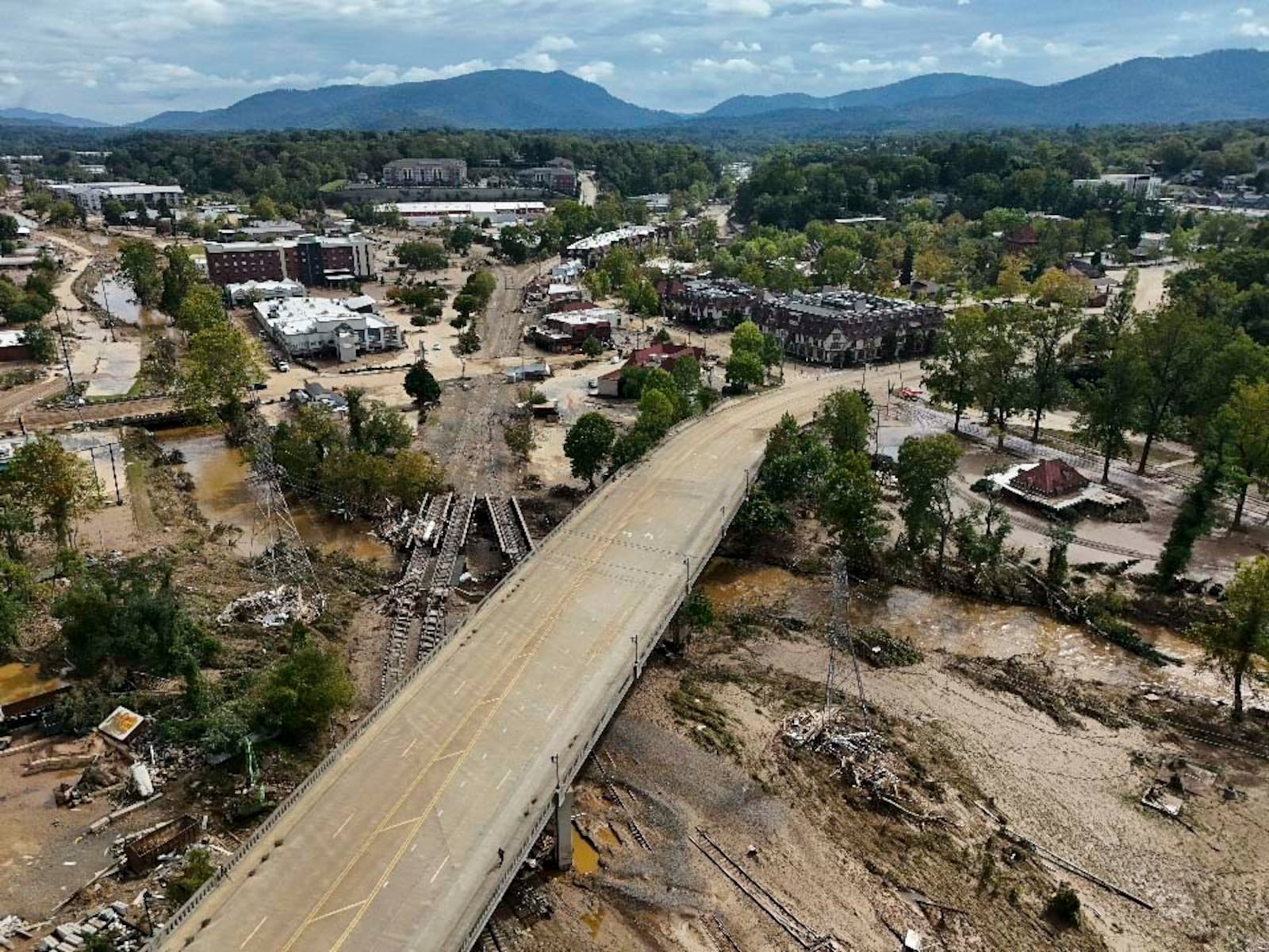 Debris is seen in the aftermath of Hurricane Helene, Monday, Sept. 30, 2024, in Asheville, N.C. (AP Photo/Mike Stewart)