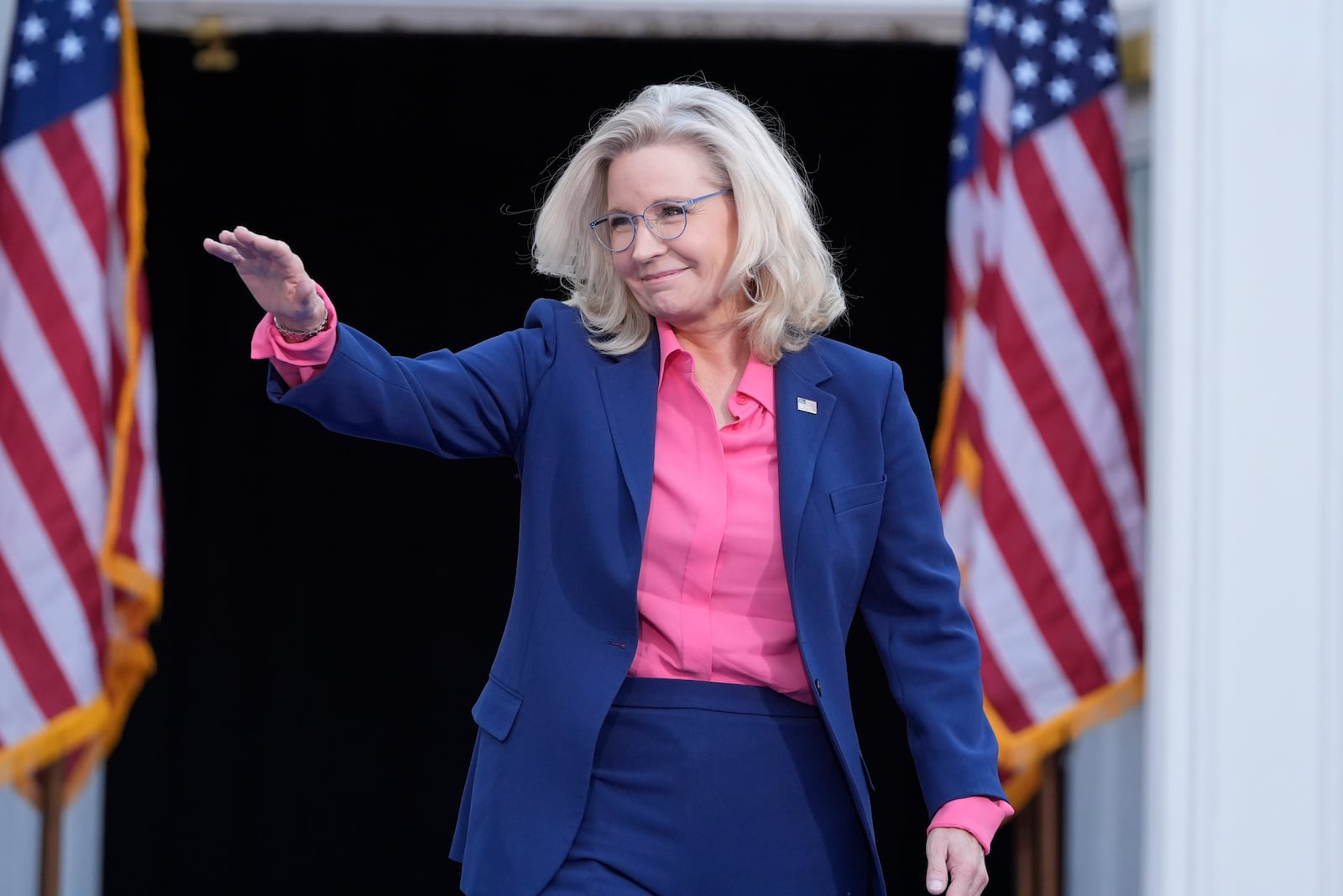 Former Congresswoman Liz Cheney, R-Wyo., arrives to speak at a campaign event for Democratic presidential nominee Vice President Kamala Harris at Ripon College in Ripon, Wis., Thursday, Oct. 3, 2024. (AP Photo/Mark Schiefelbein)