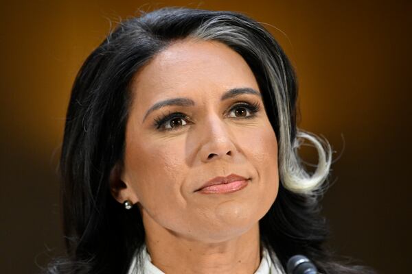 Tulsi Gabbard, President Donald Trump's choice to be the Director of National Intelligence, arrives to appear before the Senate Intelligence Committee for her confirmation hearing on Capitol Hill Thursday, Jan. 30, 2025, in Washington. (AP Photo/John McDonnell)
