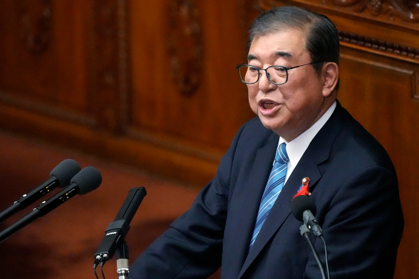 Japanese Prime Minister Shigeru Ishiba delvers his first policy speech during a Diet session at the Lower House of the Parliament Friday, Oct. 4, 2024, in Tokyo. (AP Photo/Eugene Hoshiko)