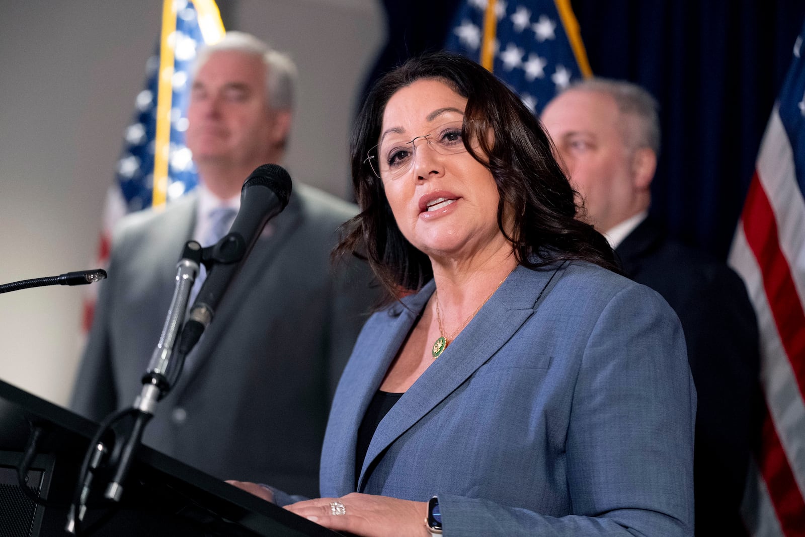 FILE - Rep. Lori Chavez-DeRemer, R-Ore., accompanied by Majority Whip Rep. Tom Emmer, R-Minn., left, and House Majority Leader Rep. Steve Scalise, R-La., right, speaks at a news conference on Capitol Hill in Washington, Wednesday, Jan. 25, 2023. (AP Photo/Andrew Harnik, File)