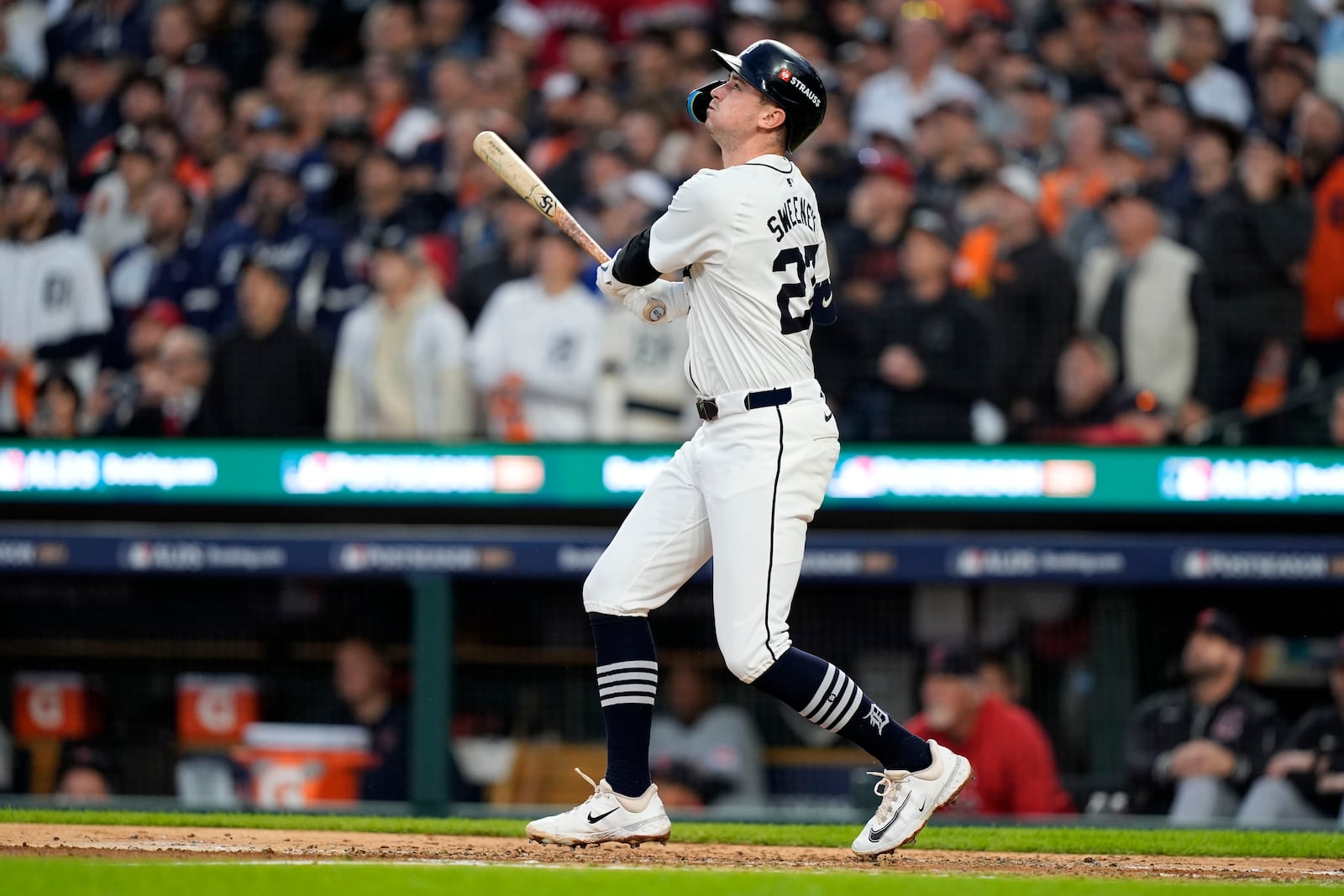 Detroit Tigers' Trey Sweeney hits an RBI sacrifice fly in the second inning during Game 4 of a baseball American League Division Series against the Cleveland Guardians, Thursday, Oct. 10, 2024, in Detroit. (AP Photo/Carlos Osorio)