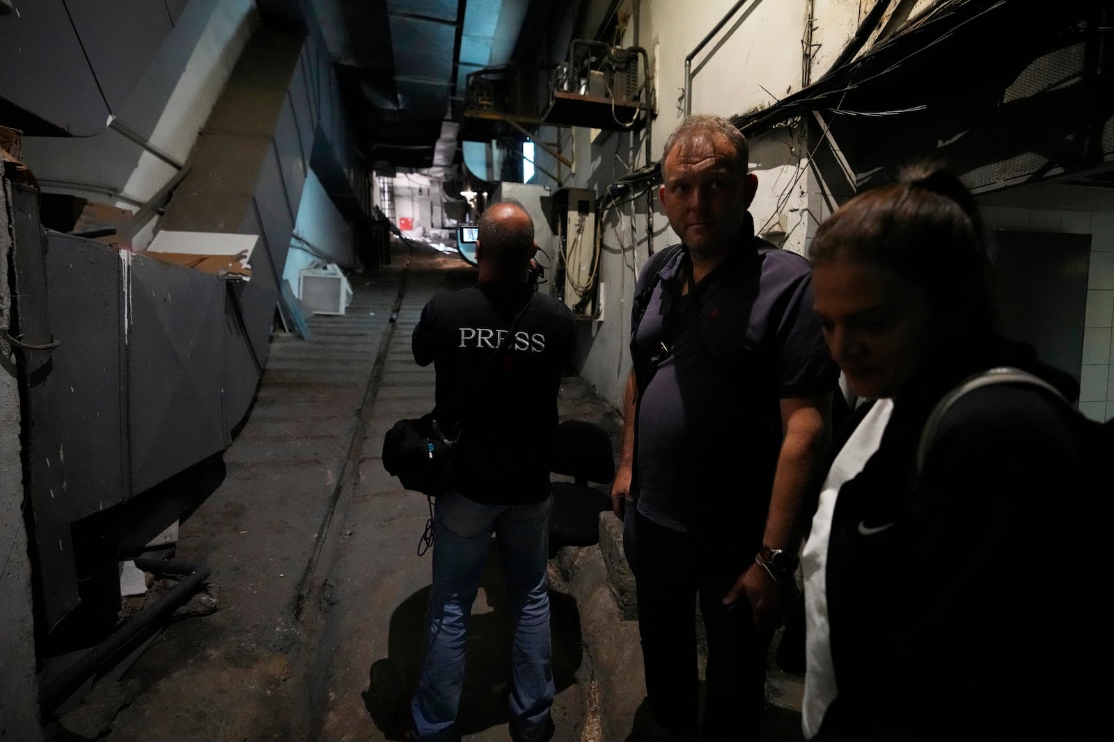 Foreign and local journalists take a tour inside Sahel General Hospital, in Dahiyeh, Beirut, Lebanon, Tuesday, Oct. 22, 2024. (AP Photo/Hassan Ammar)