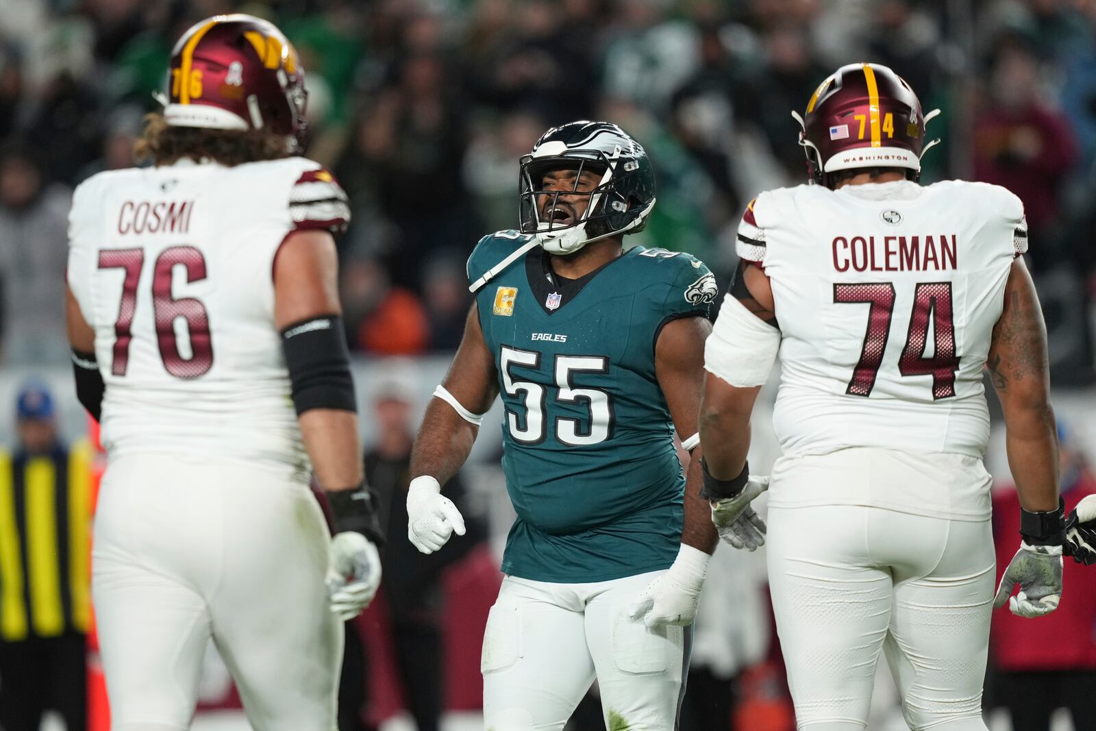 Philadelphia Eagles defensive end Brandon Graham (55) celebrates sacking Washington Commanders quarterback Jayden Daniels during the first half of an NFL football game Thursday, Nov. 14, 2024, in Philadelphia. (AP Photo/Matt Slocum)