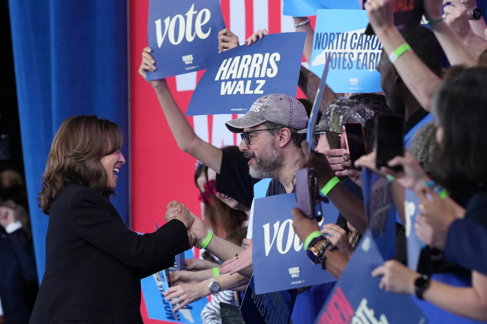 Democratic presidential nominee Vice President Kamala Harris arrives to speak at a rally at the Coastal Credit Union Music Park at Walnut Creek in Raleigh, N.C., Wednesday, Oct. 30, 2024. (AP Photo/Susan Walsh)