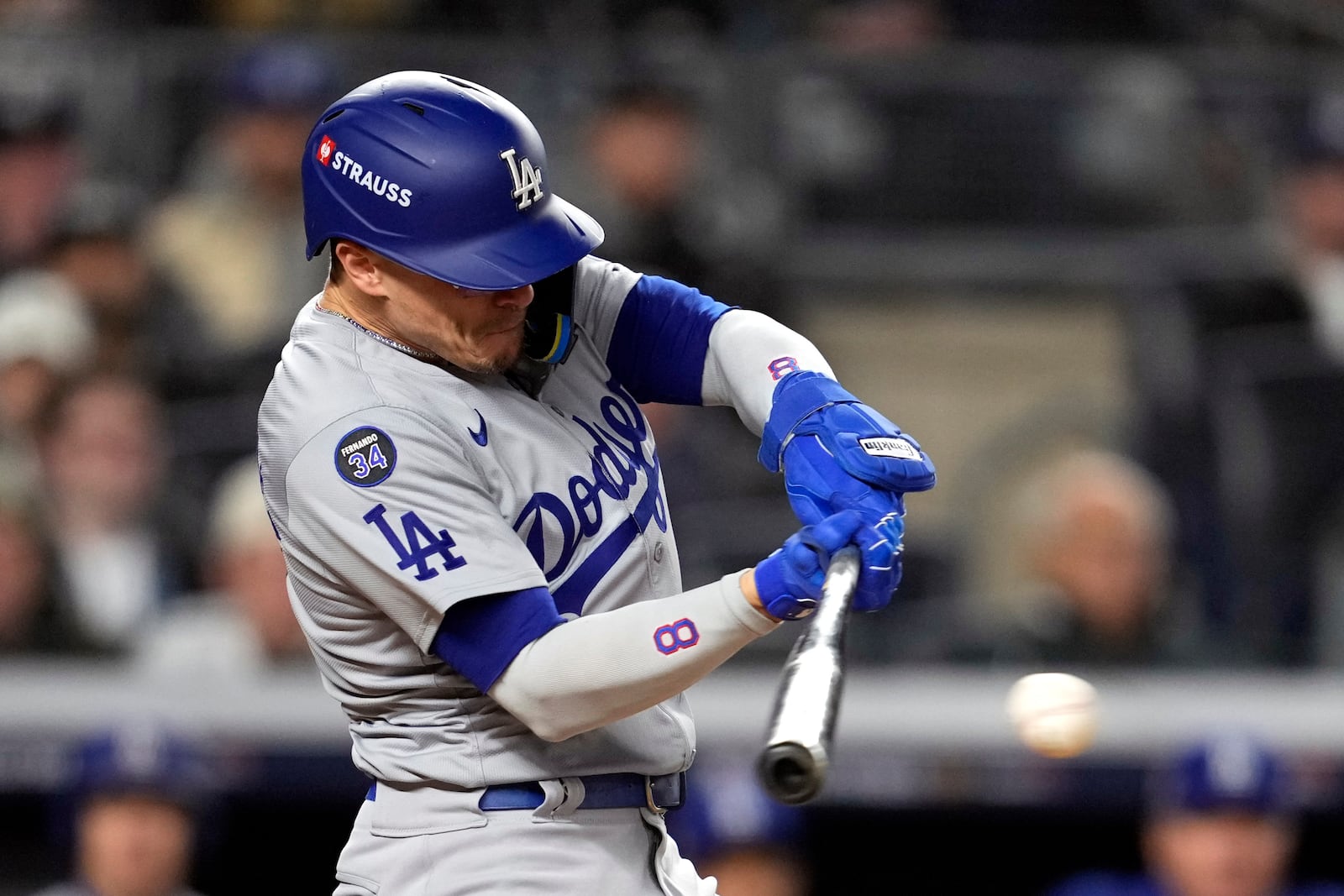 Los Angeles Dodgers' Kiké Hernández hits a RBI single against the New York Yankees during the sixth inning in Game 3 of the baseball World Series, Monday, Oct. 28, 2024, in New York. (AP Photo/Godofredo A. Vásquez)