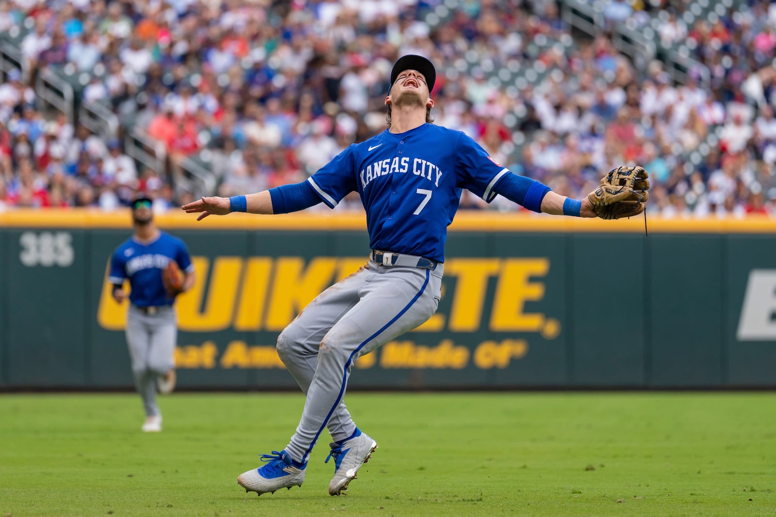 Kansas City Royals shortstop Bobby Witt Jr. (7) waves off teammates to catch a pop fly hit by Atlanta Braves' Matt Olson in the first inning of a baseball game Sunday, Sept. 29, 2024, in Atlanta. (AP Photo/Jason Allen)