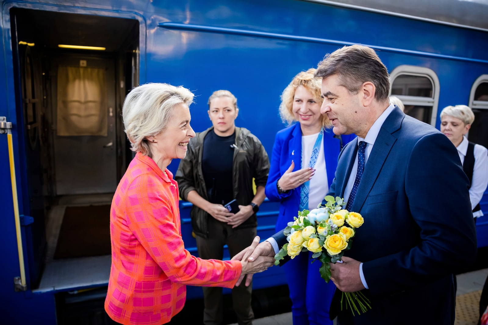 President of the European Commission, Ursula von der Leyen, left, is greeted as she arrives at the railway station in Kyiv, Ukraine, Friday, Sept. 20, 2024. (Christoph Soeder, Pool via AP)