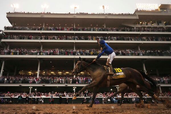 Sovereignty, ridden by Junior Alvarado, crosses the finish line to win the 151st running of the Kentucky Derby horse race at Churchill Downs Saturday, May 3, 2025, in Louisville, Ky. (AP Photo/Abbie Parr)