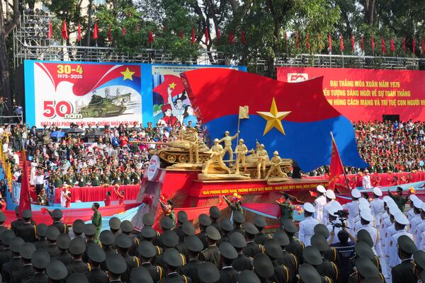 A float depicting a tank is carried in a parade celebrating the 50th anniversary of the end of the Vietnam War in Ho Chi Minh City, Vietnam, Wednesday, April 30, 2025. (AP Photo/Achmad Ibrahim)