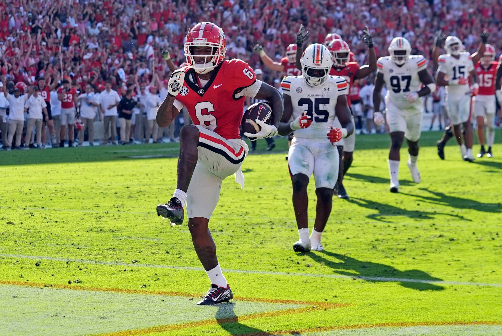 Georgia wide receiver Dominic Lovett (6) runs in for a touchdown after catching a pass in the first half of an NCAA college football game against Auburn Saturday, Oct. 5, 2024, in Athens, Ga. (AP Photo/John Bazemore)