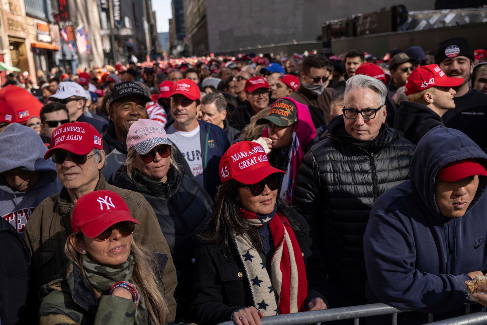 Supporters of Republican presidential nominee former President Donald Trump gather for his campaign rally outside Madison Square Garden, Sunday, Oct. 27, 2024, in New York. (AP Photo/Yuki Iwamura)