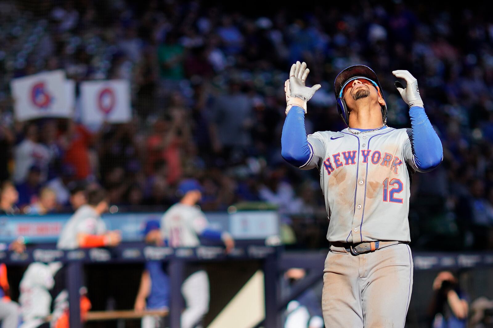 New York Mets' Francisco Lindor gestures after hitting a solo home run during the sixth inning of a baseball game against the Milwaukee Brewers, Sunday, Sept. 29, 2024, in Milwaukee. (AP Photo/Aaron Gash)