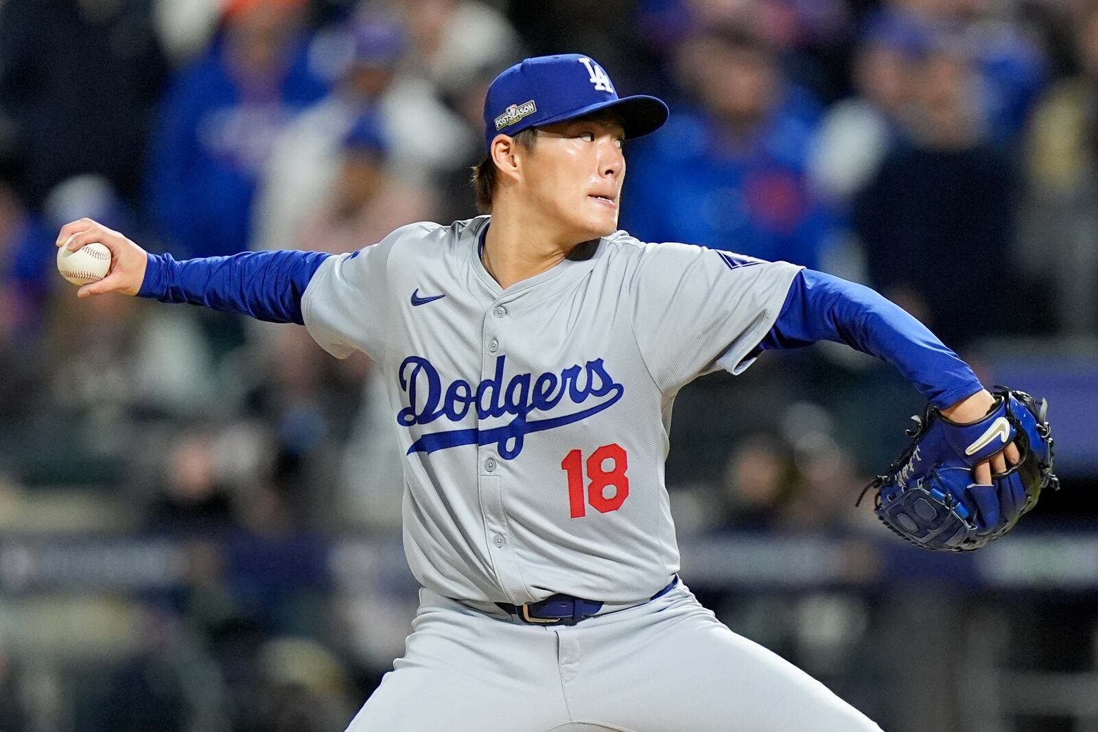 Los Angeles Dodgers pitcher Yoshinobu Yamamoto throws against the New York Mets during the first inning in Game 4 of a baseball NL Championship Series, Thursday, Oct. 17, 2024, in New York. (AP Photo/Frank Franklin II)