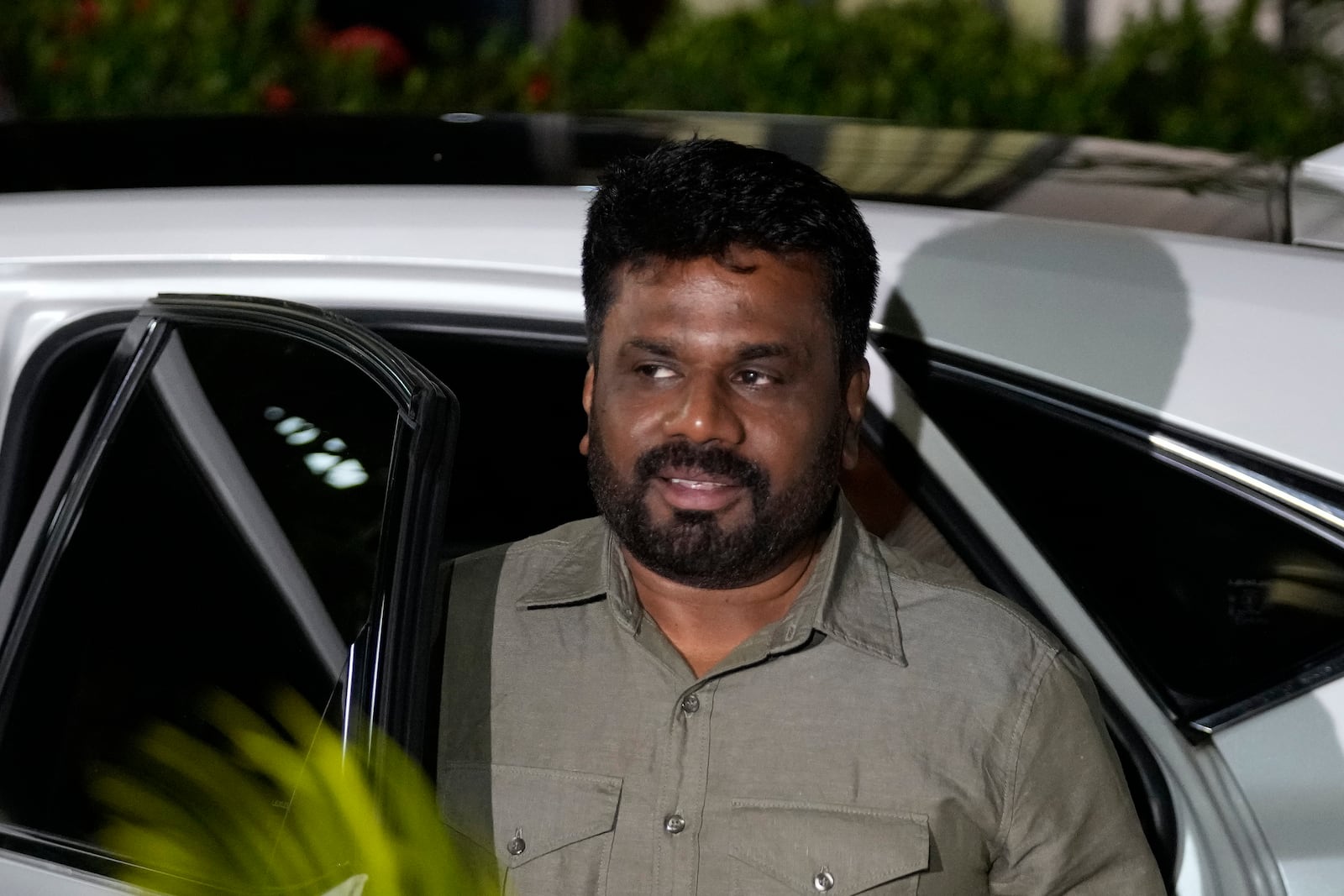 Marxist lawmaker Anura Kumara Dissanayake arrives at the election commission office after winning Sri Lankan presidential election, in Colombo, Sri Lanka, Sunday, Sept. 22, 2024. (AP Photo/Eranga Jayawardane)