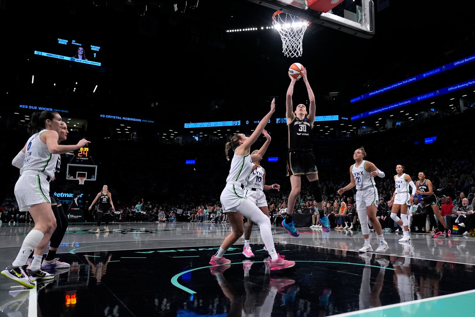 New York Liberty's Breanna Stewart shoots the ball during the first half in Game 1 of a WNBA basketball final playoff series against the Minnesota Lynx, Thursday, Oct. 10, 2024, in New York. (AP Photo/Pamela Smith)