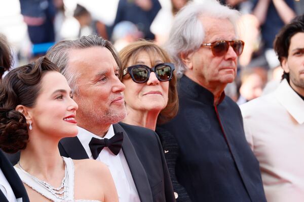 Zoey Deutch, from left, director Richard Linklater, Michele Halberstadt and producer Laurent Petin pose for photographers upon arrival at the premiere of the film 'Nouvelle Vague' at the 78th international film festival, Cannes, southern France, Saturday, May 17, 2025. (Photo by Joel C Ryan/Invision/AP)