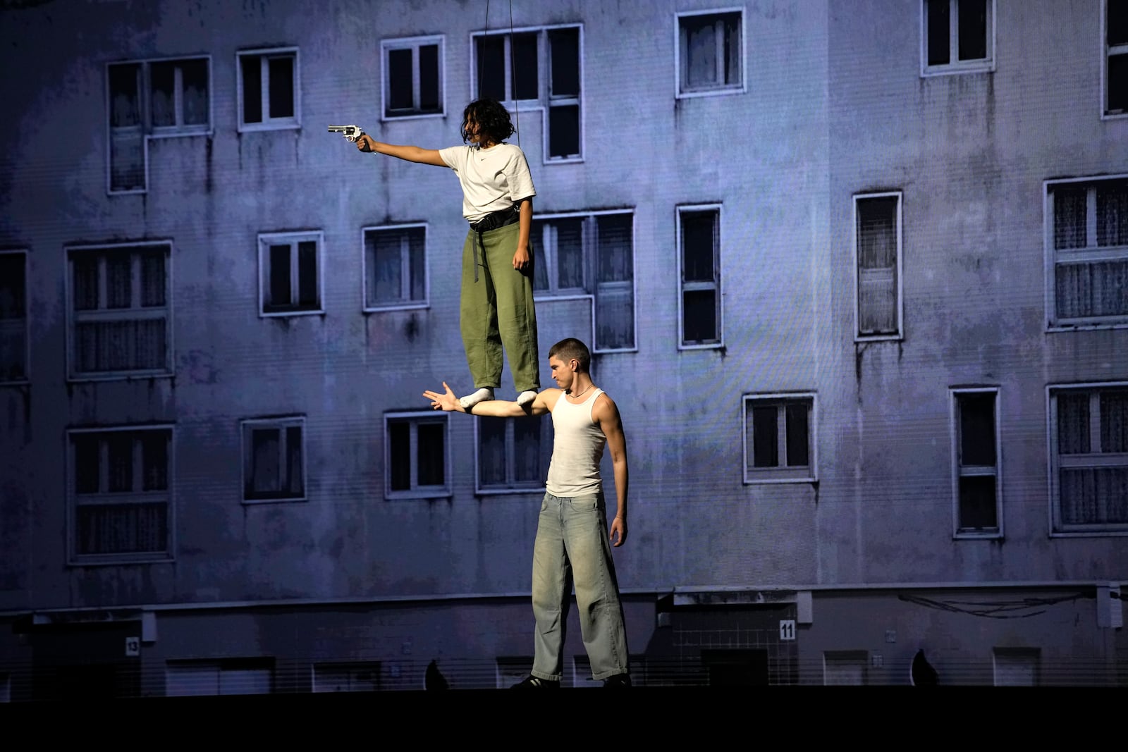 Actors perform during a rehearsal of La Haine musical show, in Tremblay en France, Tuesday, Sept. 17, 2024. (AP Photo/Christophe Ena)