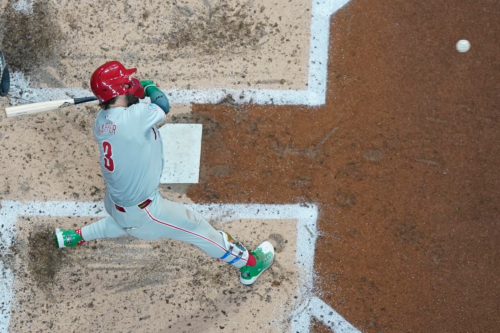 Philadelphia Phillies' Bryce Harper hits a single during the fourth inning of a baseball game against the Milwaukee Brewers Monday, Sept. 16, 2024, in Milwaukee. (AP Photo/Morry Gash)