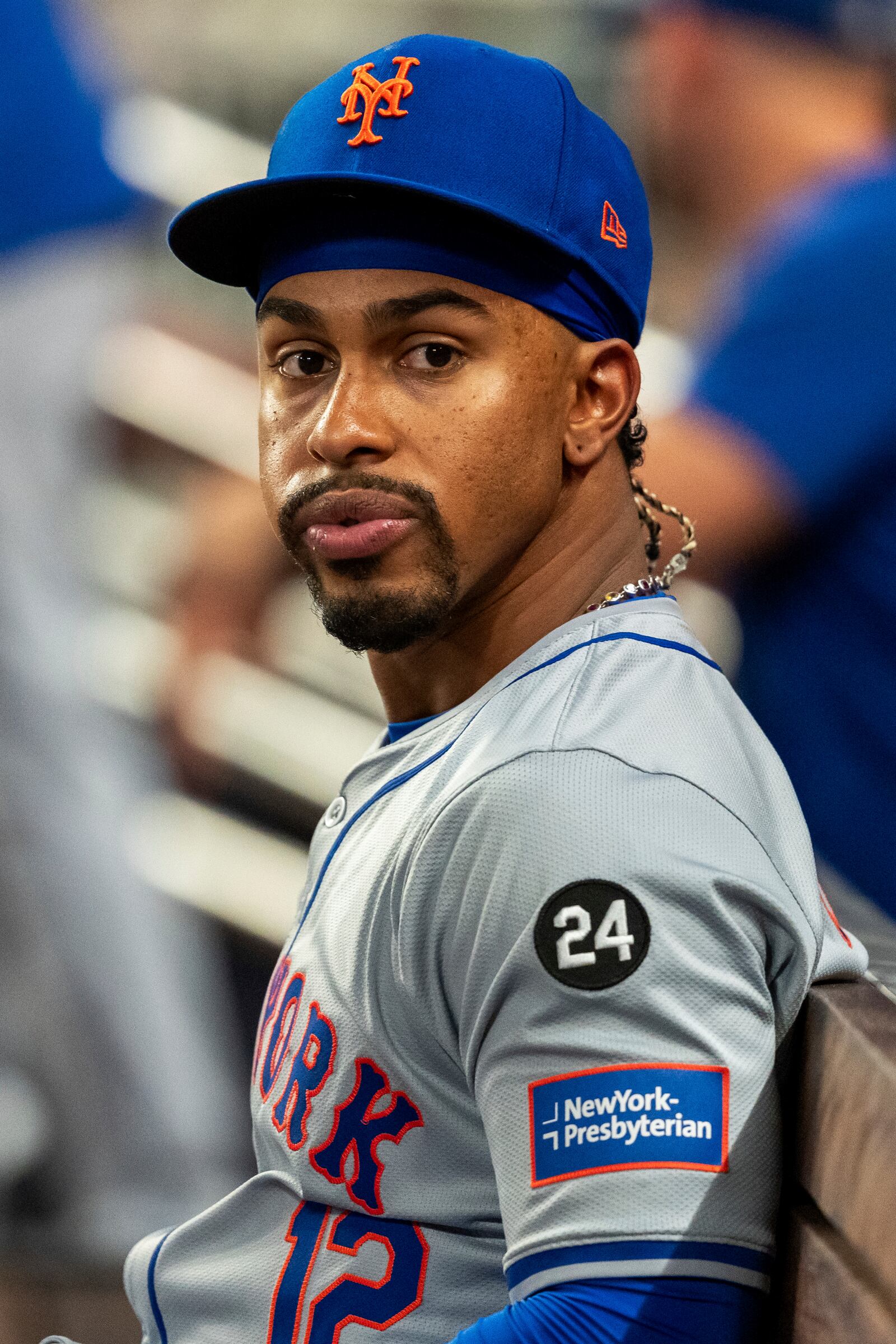 New York Mets shortstop Francisco Lindor sits in the dugout during the third inning of a baseball game against the Atlanta Braves, Tuesday, Sept. 24, 2024, in Atlanta. (AP Photo/Jason Allen)