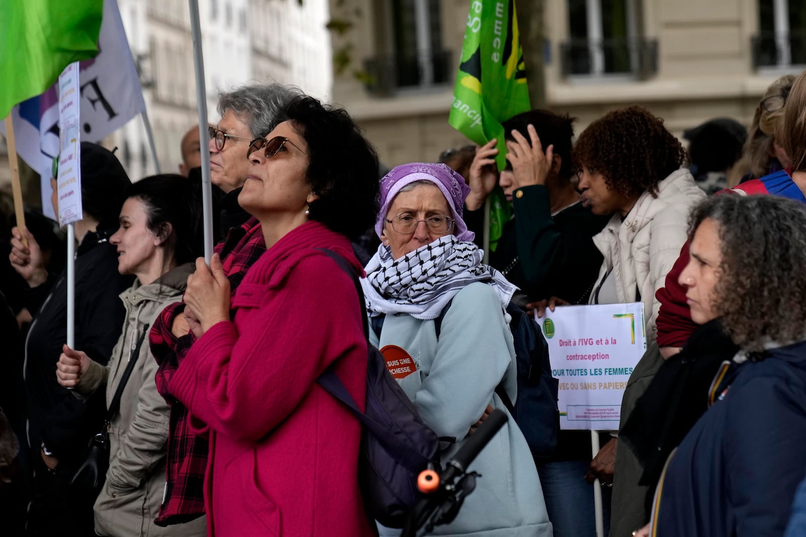 Demonstrators attend a march in support of the right to abortion for women across the world, in Paris, Saturday, Sept. 28, 2024. (AP Photo/Christophe Ena)