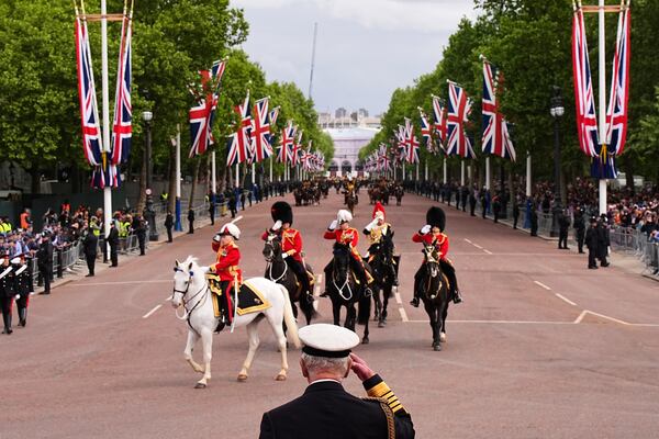 Britain's King Charles III takes the salute from the military procession marking the 80th anniversary of VE Day, in London, Monday, May 5, 2025. (Aaron Chown/Pool Photo via AP)