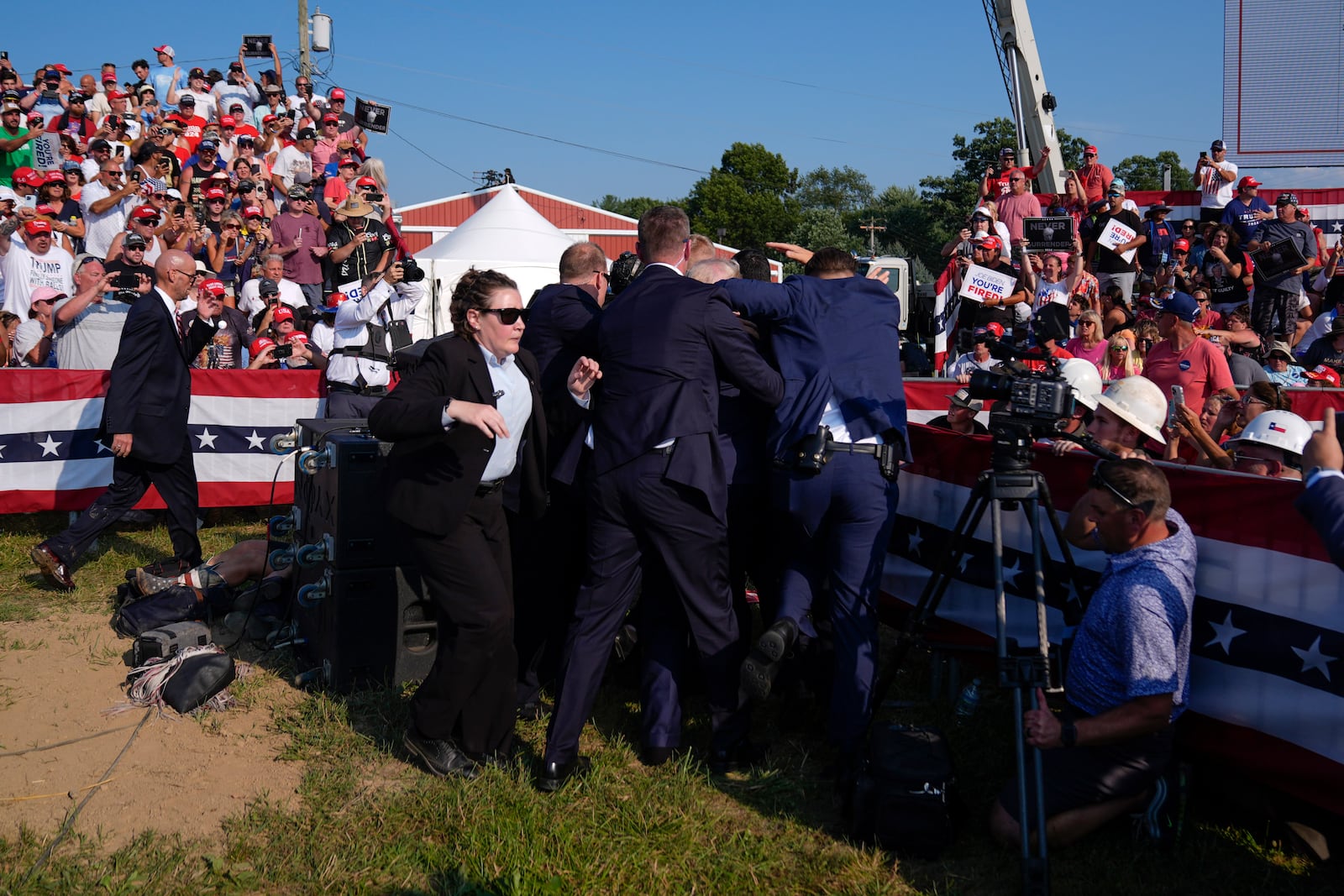 FILE - Republican presidential candidate former President Donald Trump is surrounded by U.S. Secret Service agents at a campaign rally, July 13, 2024, in Butler, Pa. (AP Photo/Evan Vucci, File)