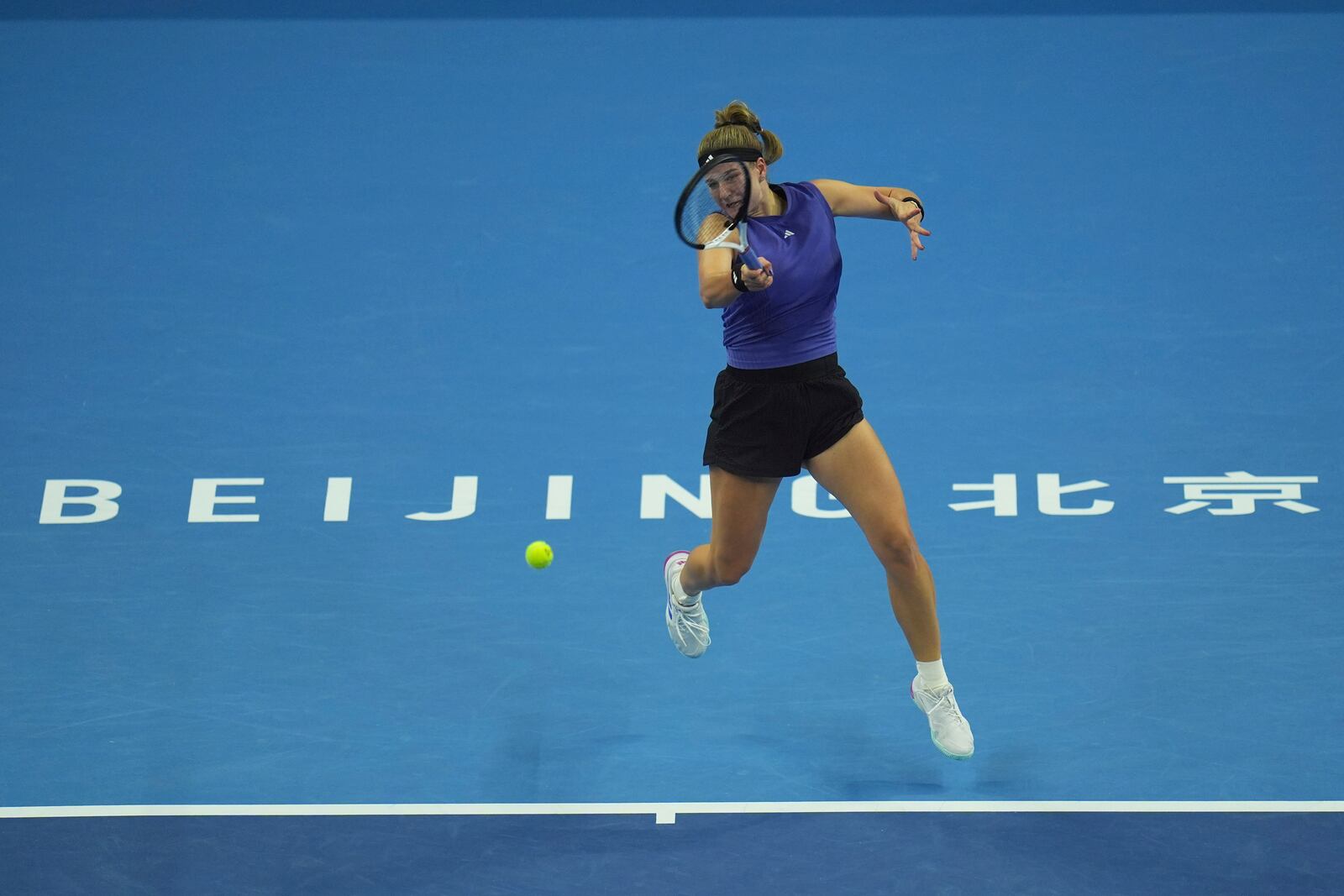 Karolina Muchova of Czech Republic returns a shot to Coco Gauff of the United States during the women's singles final match at the China Open tennis tournament at the National Tennis Center in Beijing, Sunday, Oct. 6, 2024. (AP Photo/Ng Han Guan)