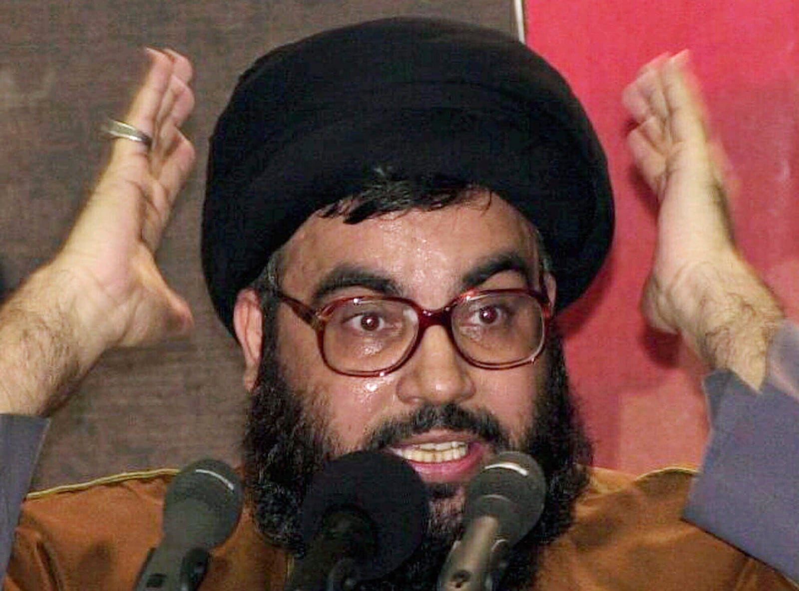 FILE - Hezbollah leader Hassan Nasrallah speaks during a banquet in Beirut, Wednesday Dec. 13, 2000. (AP Photo/Hussein Malla, File)