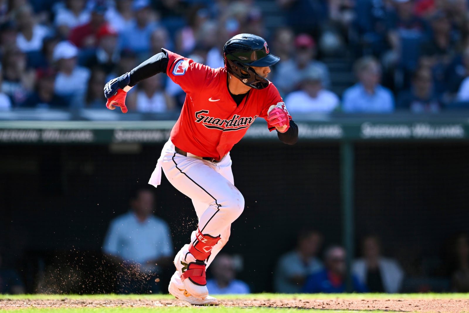 Cleveland Guardians' Andrés Giménez runs out an infield single during the sixth inning of a baseball game against the Minnesota Twins, Thursday, Sept. 19, 2024, in Cleveland. (AP Photo/Nick Cammett)