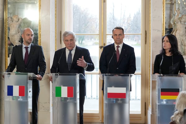 French Minister for Europe and Foreign Affairs Jean-Noel Barrot, left, Italian Foreign Minister Antonio Tajani, second left, Polish Foreign Minister Radoslaw Sikorski and German Foreign Minister Annalena Baerbock, right, attend a press conference as European foreign ministers meet in Warsaw, Poland, Tuesday, Nov. 19, 2024. (AP Photo/Czarek Sokolowski)