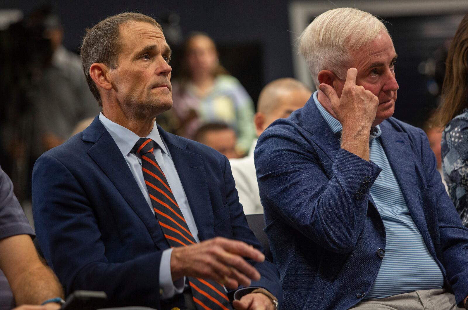 University of Virginia President Jim Ryan, left, and Robert Hardie, Rector of the school's Board of Visitors, attend a press conference where Virginia NCAA college basketball coach Tony Bennett announced his retirement in Charlottesville, Va., Friday, Oct. 18, 2024. (Cal Cary/The Daily Progress via AP)