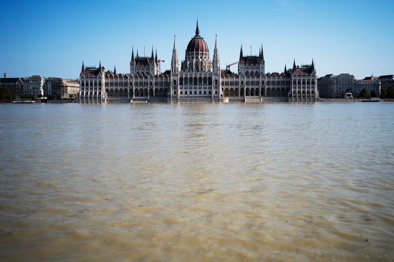 General view of the Parliament building as the Danube river floods its banks, central Budapest, Hungary, Thursday, Sept. 19, 2024. (AP Photo/Denes Erdos)