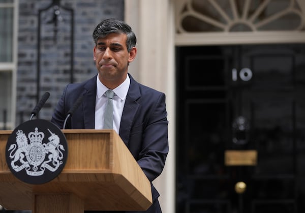 FILE - Britain's outgoing Conservative Party Prime Minister Rishi Sunak looks down as he makes a short speech outside 10 Downing Street before going to see King Charles III to tender his resignation in London, Friday, July 5, 2024. (AP Photo/Kin Cheung, file)