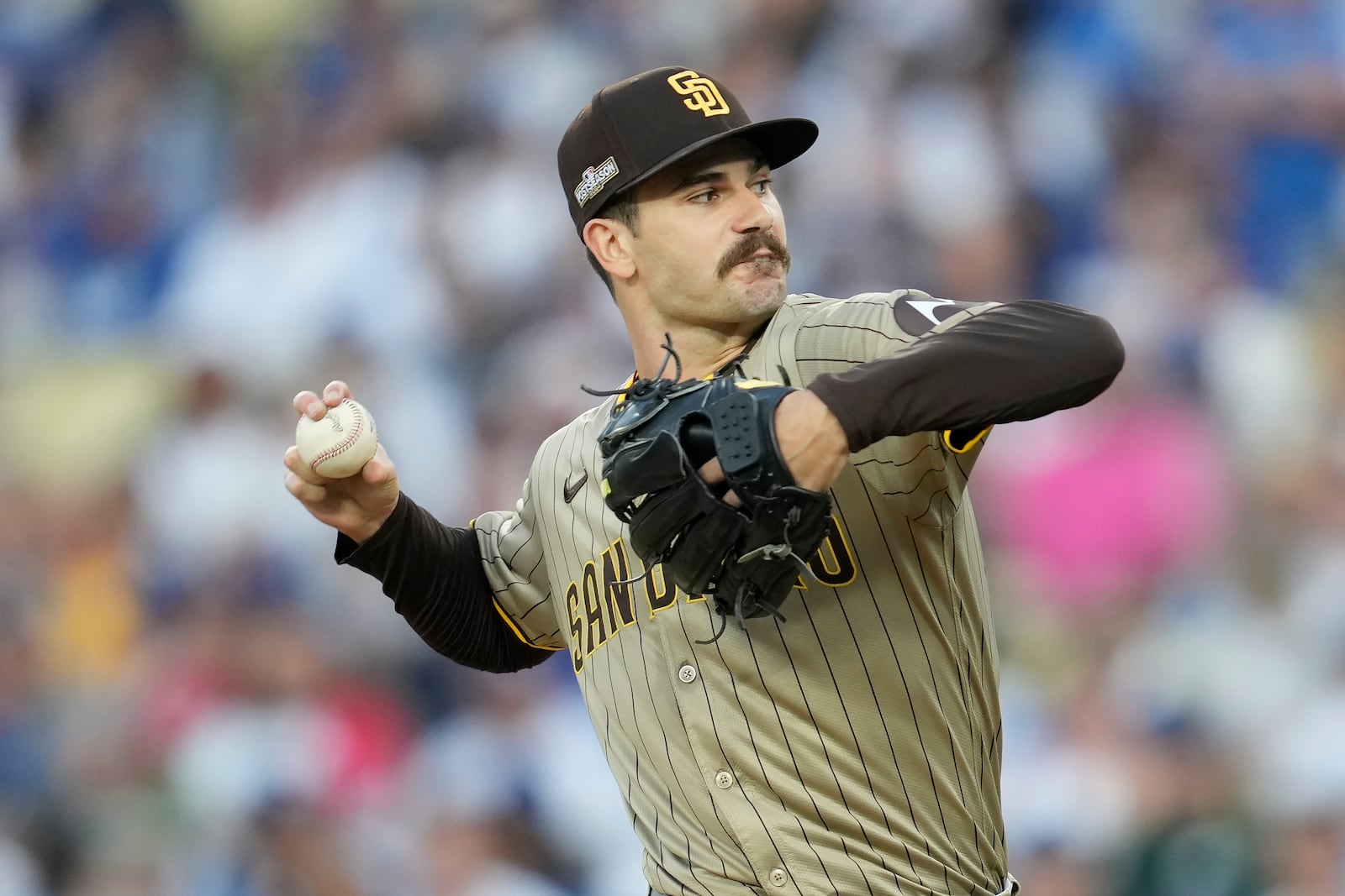 San Diego Padres pitcher Dylan Cease throws to a Los Angeles Dodgers batter during the first inning in Game 1 of baseball's NL Division Series Saturday, Oct. 5, 2024, in Los Angeles. (AP Photo/Ashley Landis)