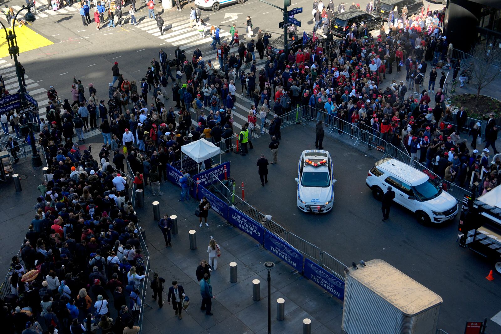 A crowd stands in line before a campaign rally for Republican presidential nominee former President Donald Trump at Madison Square Garden, Sunday, Oct. 27, 2024, in New York. (AP Photo/Julia Demaree Nikhinson)