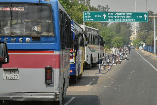 Buses carrying Pakistan nationals from India wait to cross over at the Attari-Wagah border between India and Pakistan, following New Delhi’s decision to order almost all Pakistani citizens to leave the country after last week’s deadly attack in Indian-controlled Kashmir, Wednesday, April 30, 2025. (AP Photo/Prabhjot Gill)