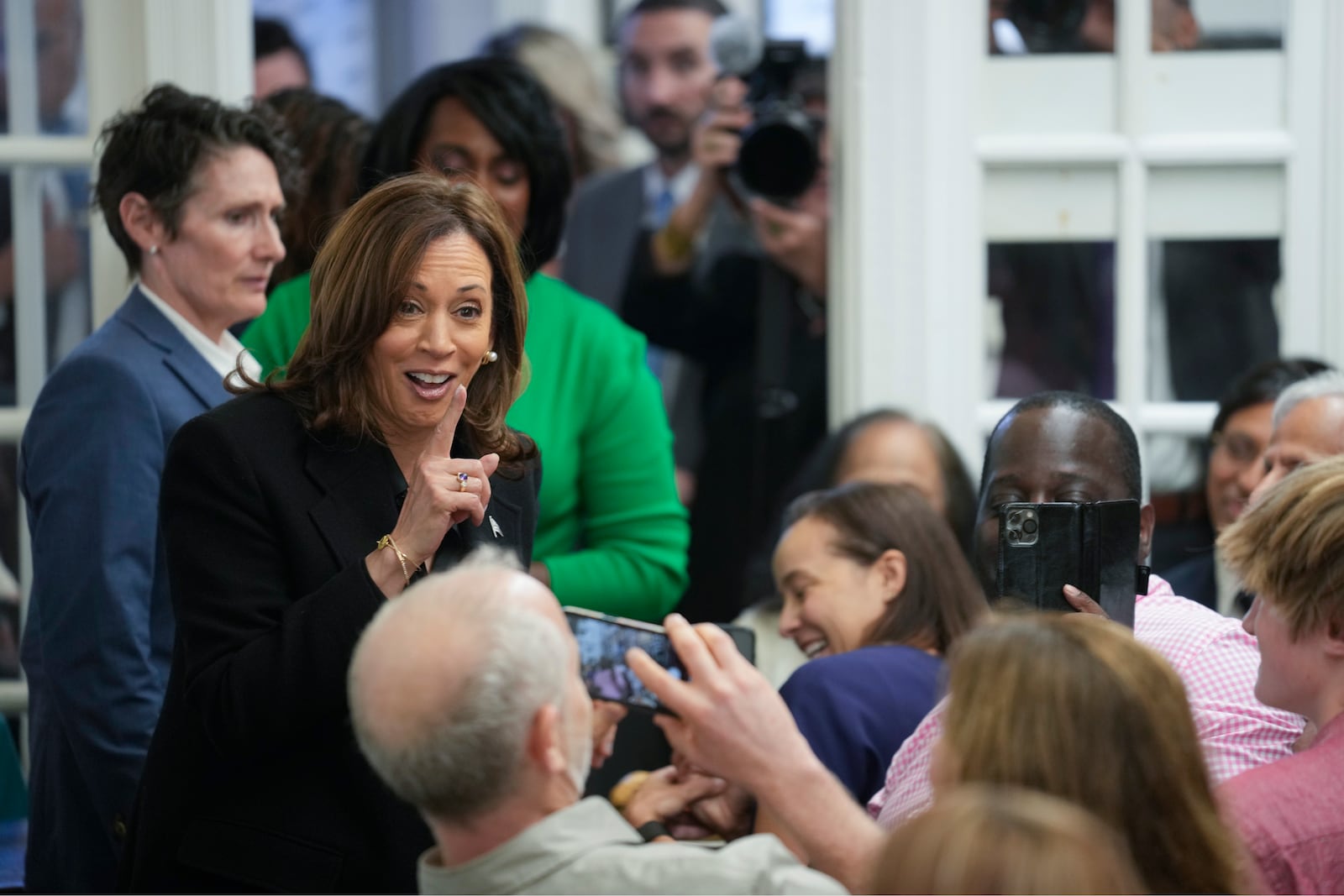 Democratic presidential nominee Vice President Kamala Harris speaks to patrons at a campaign stop at Famous 4th Street Delicatessen in Philadelphia, Wednesday, Oct. 23, 2024. (AP Photo/Matt Rourke)