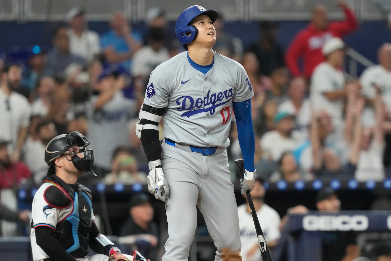 Los Angeles Dodgers' Shohei Ohtani (17) looks up after hitting a home run during the sixth inning of a baseball game against the Miami Marlins, Thursday, Sept. 19, 2024, in Miami. (AP Photo/Marta Lavandier)