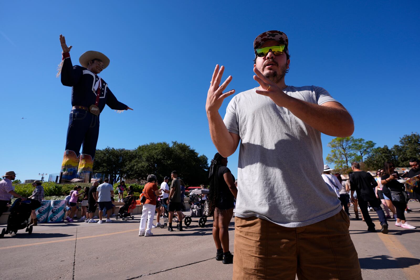 Corey McCarrell responds to a reporter's questions regarding the ban on guns at the State Fair of Texas in Dallas, on Friday, Sept. 27, 2024. (AP Photo/Tony Gutierrez)