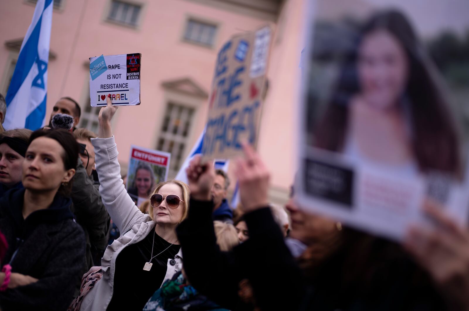 People attend a demonstration in support of Israel to mark the first anniversary of the Hamas attack on Israel, in Berlin, Germany, Sunday, Oct. 6, 2024. (AP Photo/Markus Schreiber)