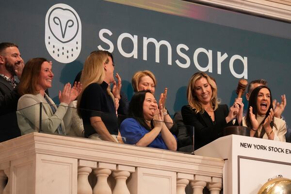 Meagen Eisenberg, second from right, Chief Marketing Officer of Samsara, gavels trading closed at the New York Stock Exchange, Tuesday, May 20, 2025. (AP Photo/Richard Drew)