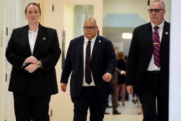 Steven Cheung walks before Republican presidential nominee former President Donald Trump votes on Election Day at the Morton and Barbara Mandel Recreation Center, Tuesday, Nov. 5, 2024, in Palm Beach, Fla. (AP Photo/Evan Vucci)