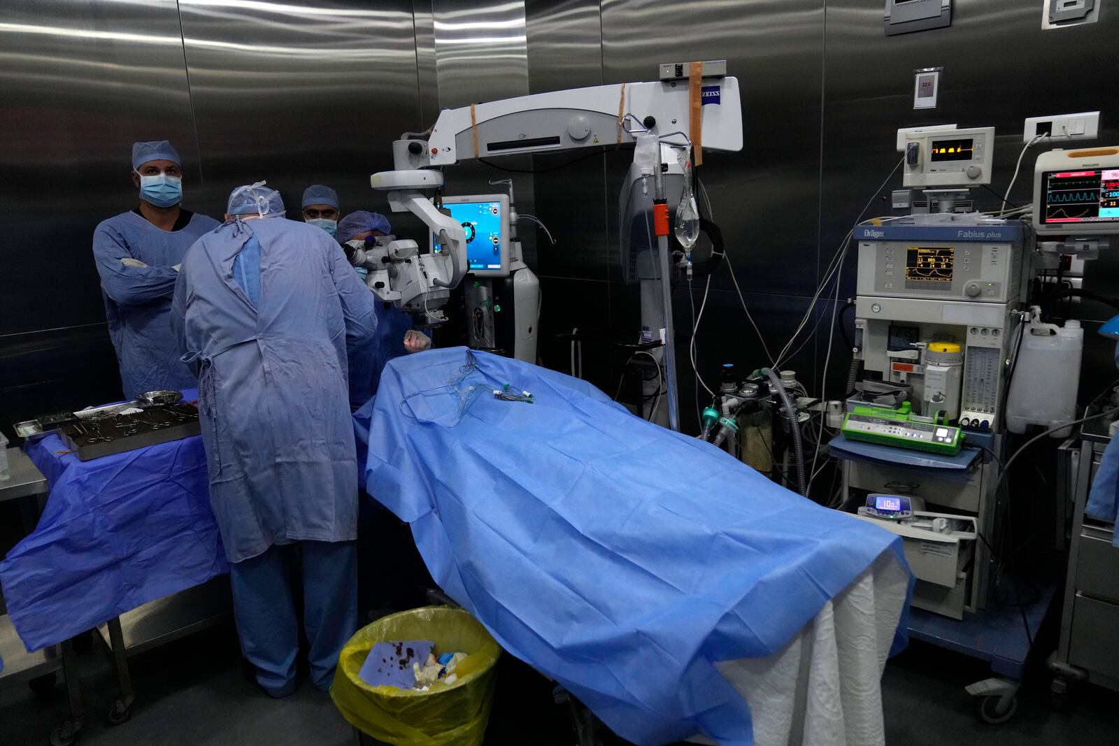 Doctors make an eye surgery operation on a man who was injured in the explosion of one of the handheld devices, at the Eye Specialist hospital, in Beirut, Lebanon, Friday, Sept. 20, 2024. (AP Photo/Hussein Malla)