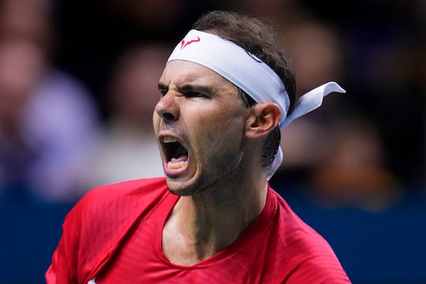 Spain's tennis player Rafael Nadal reacts during a Davis Cup quarterfinal match against Netherlands' Botic Van De Zandschulp at Martin Carpena Sports Hall in Malaga, southern Spain, on Tuesday, Nov. 19, 2024. (AP Photo/Manu Fernandez)