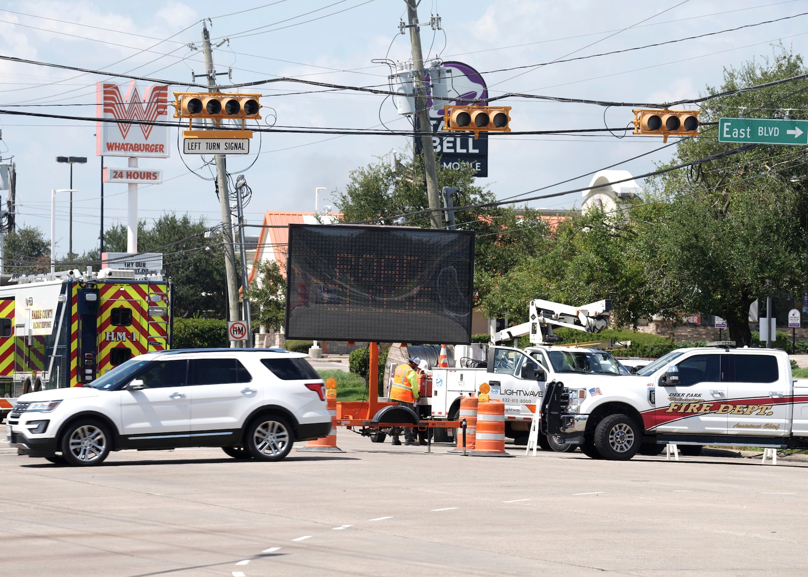 Traffic is diverted away from Spencer Highway west of East Boulevard near the site of pipeline exposition, Wednesday, Sept. 18, 2024, in La Porte, Texas. (Jason Fochtman/Houston Chronicle via AP)